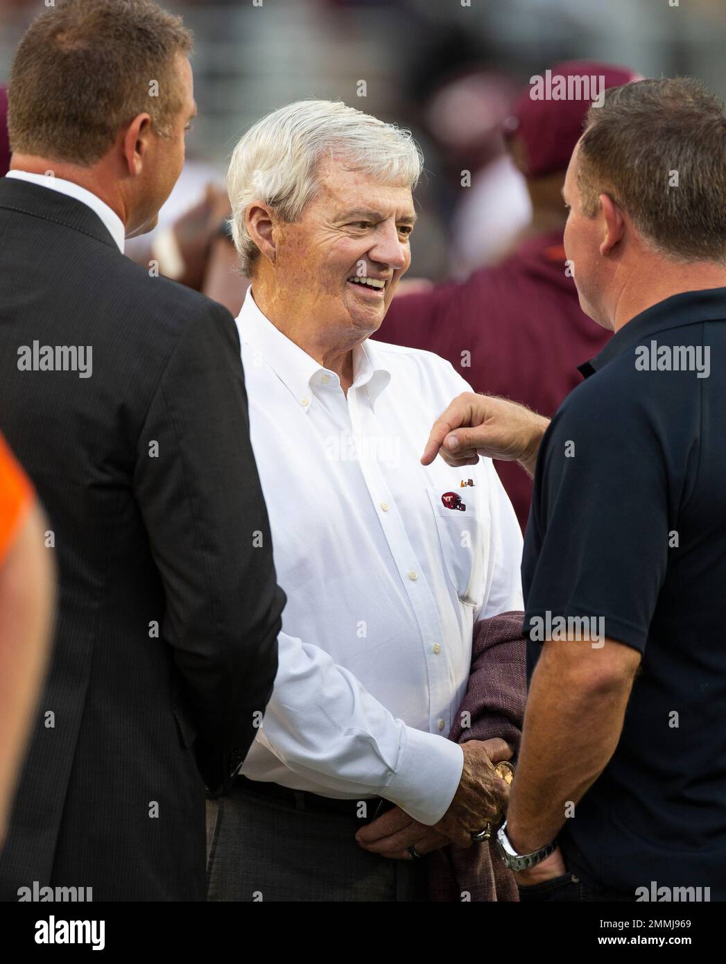 Retired Virginia Tech head coach Frank Beamer talks prior to an NCAA