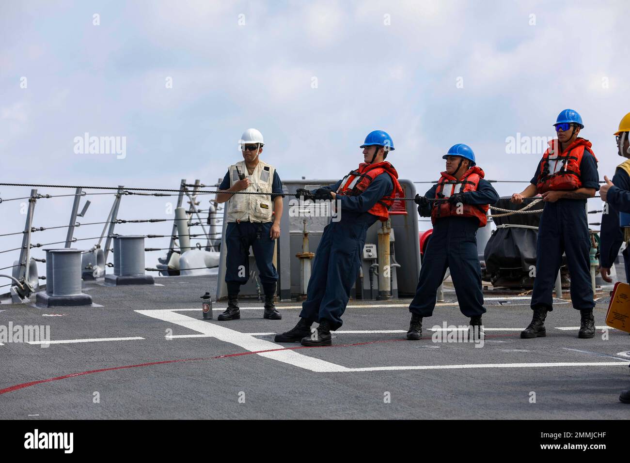SOUTH CHINA SEA (Sept. 19, 2022) Sailors handle a phone-and-distance ...