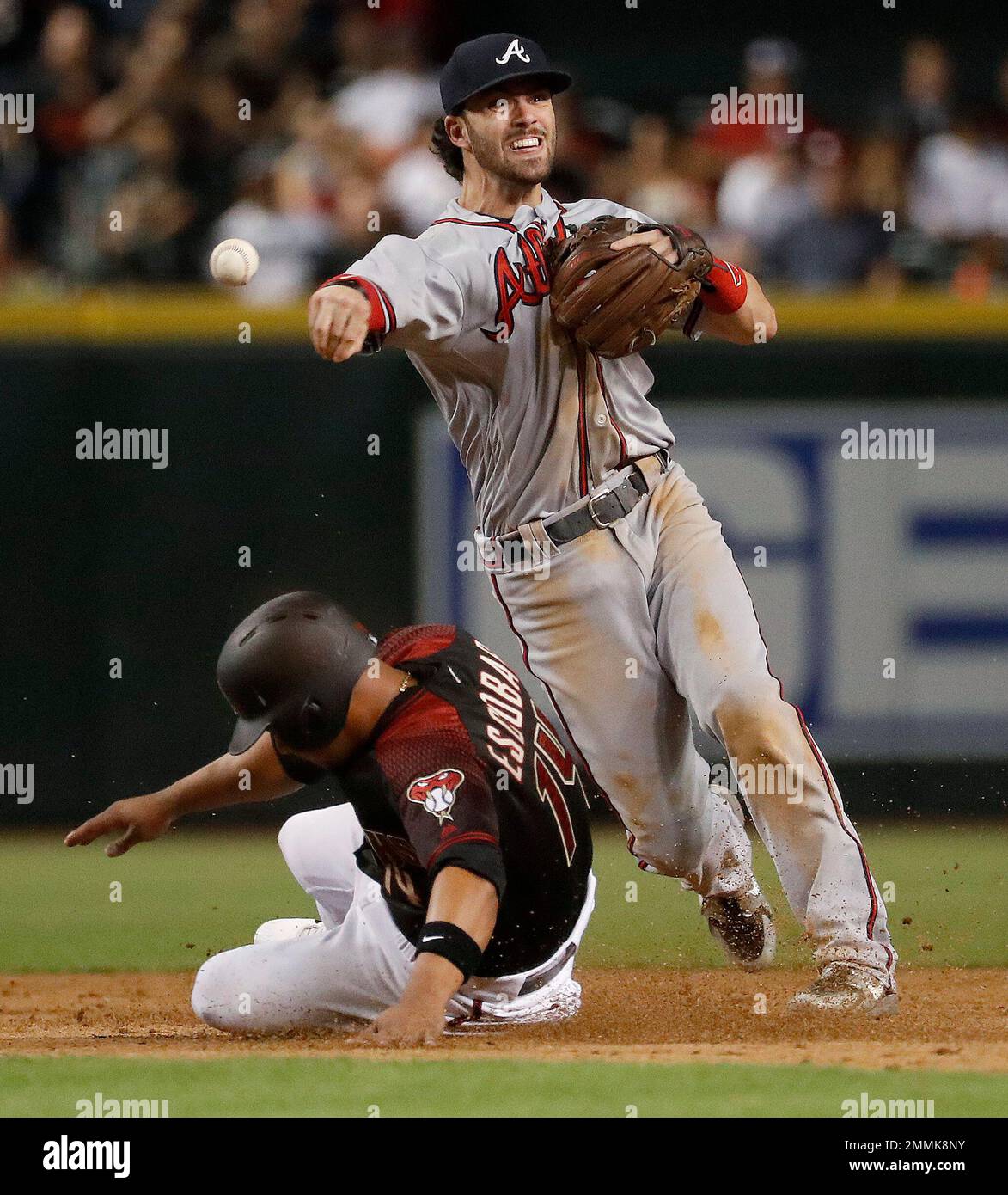 Atlanta, GA, USA. 07th Sep, 2020. Braves shortstop Dansby Swanson (right)  talks with third baseman Austin Riley (left) as they walk towards the  dugout during the sixth inning of a MLB game