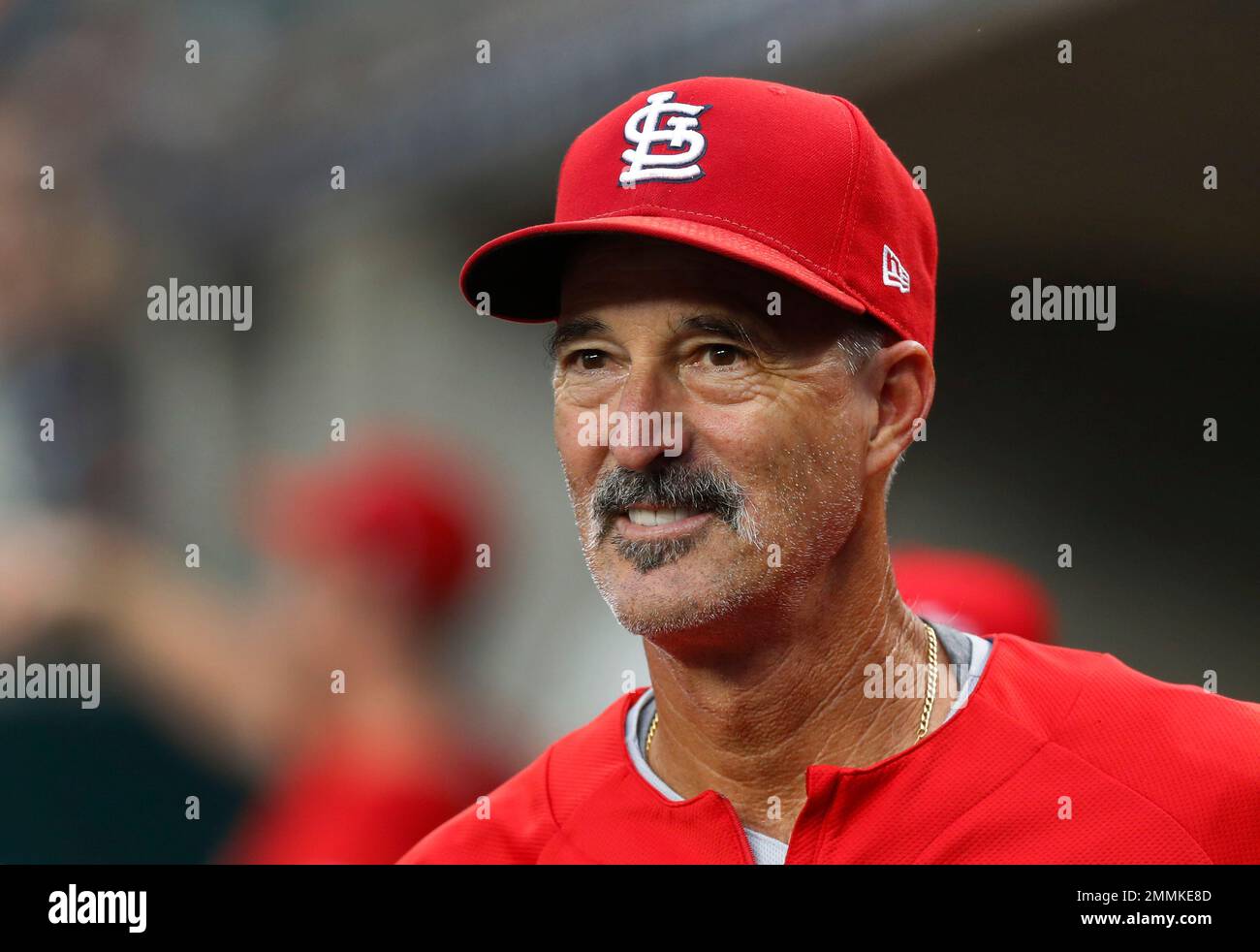 St. Louis Cardinals pitching coach Mike Maddux watches against the