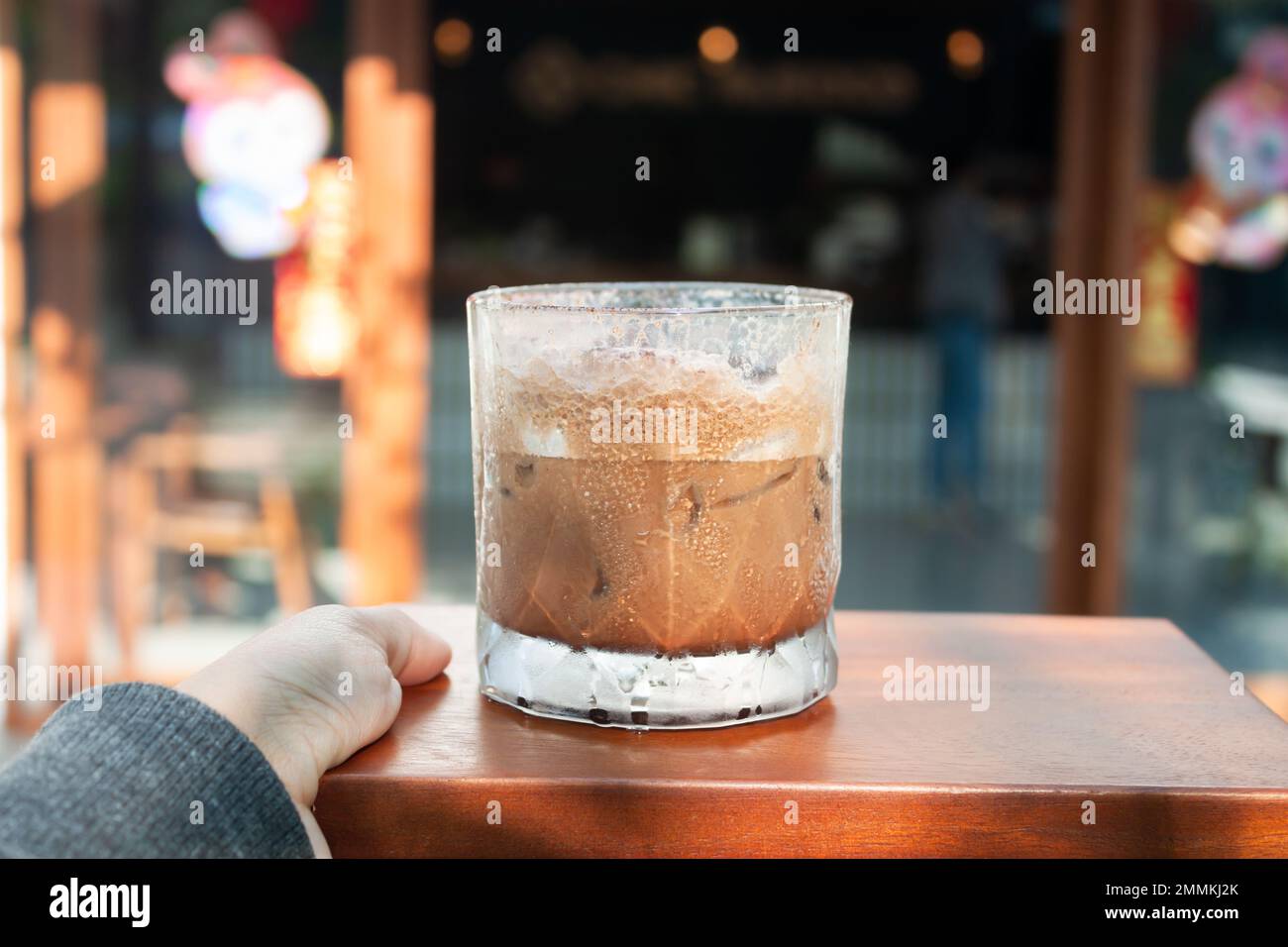 Iced coffee with micro foam in coffee shop, stock photo Stock Photo