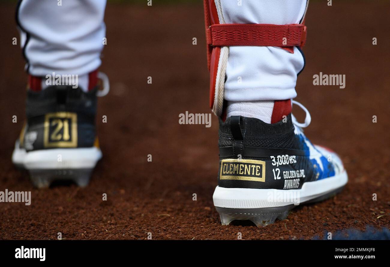 Washington Nationals' Bryce Harper wears a No. 42 hat in tribute to Jackie  Robinson as he warms up before a baseball game against the Philadelphia  Phillies, Saturday, April 15, 2017, in Washington. (