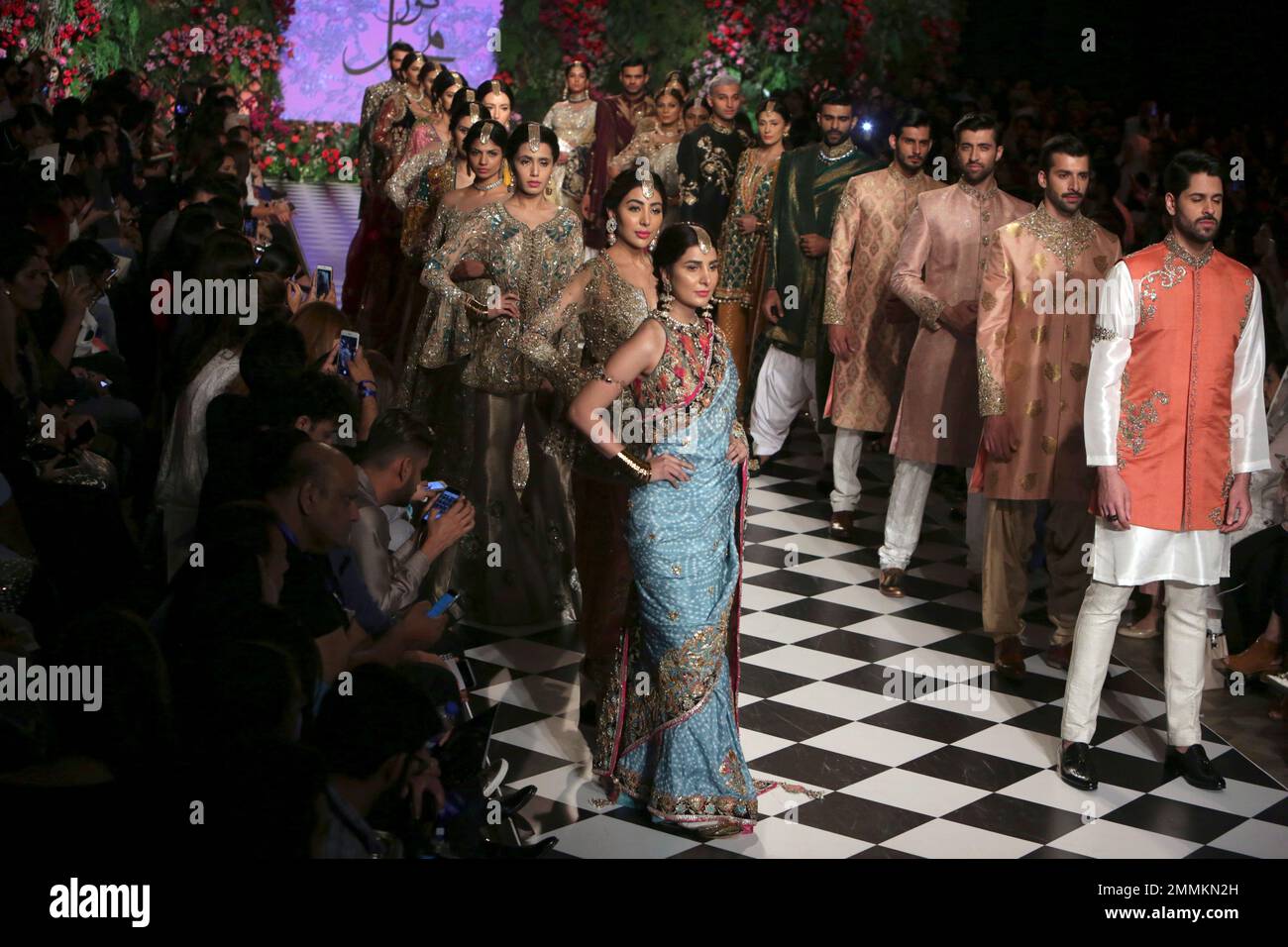 Models present traditional dresses designed by Nickie Nina during a fashion show by the Loreal Paris Pakistan Fashion Design Council in Lahore Pakistan Thursday Sept. 6 2018. AP Photo K.M. Chaudary St...