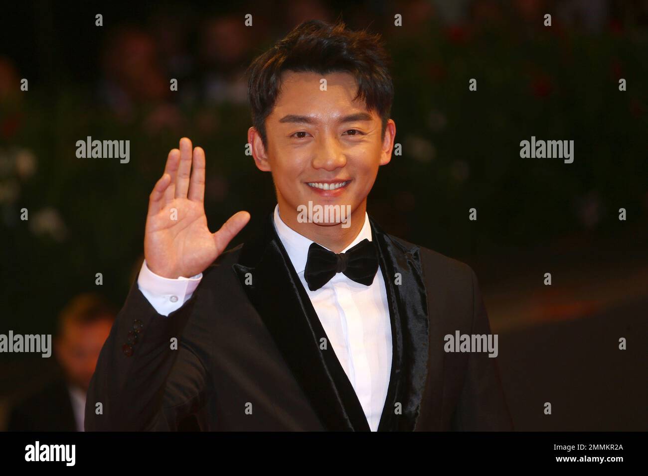 Actor Kai Zheng poses for photographers at the premiere of the film ...