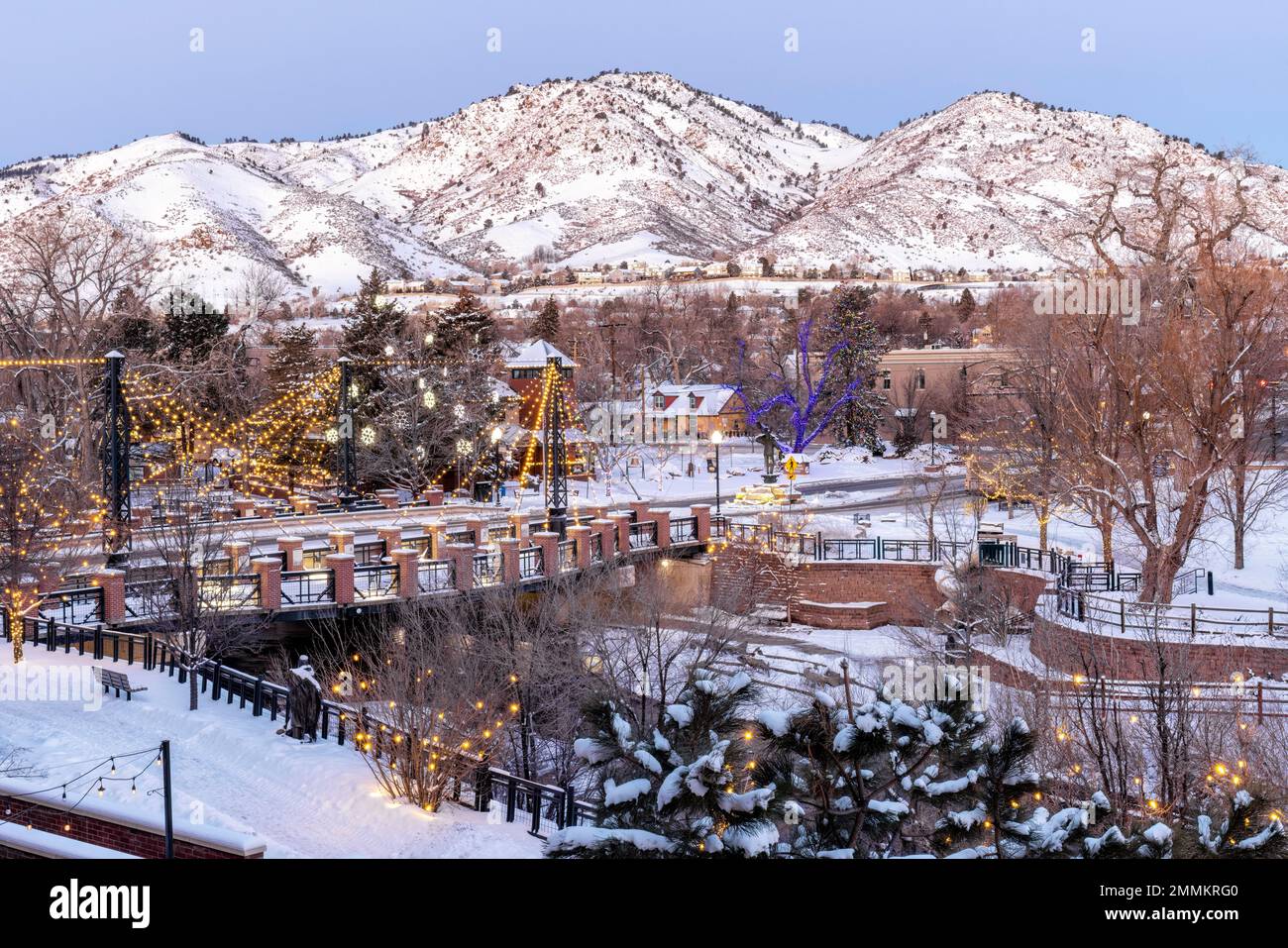 Christmas lights in winter, Golden, Colorado, USA. [Washington Avenue Bridge over Clear Creek.] Stock Photo