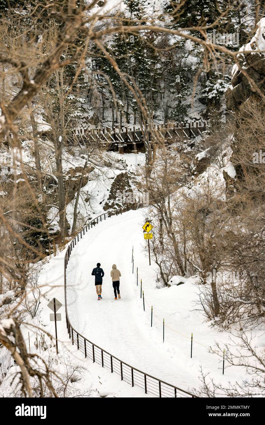 Runners on Peaks to Plains Trail in Clear Creek Canyon - near Golden, Colorado, USA Stock Photo