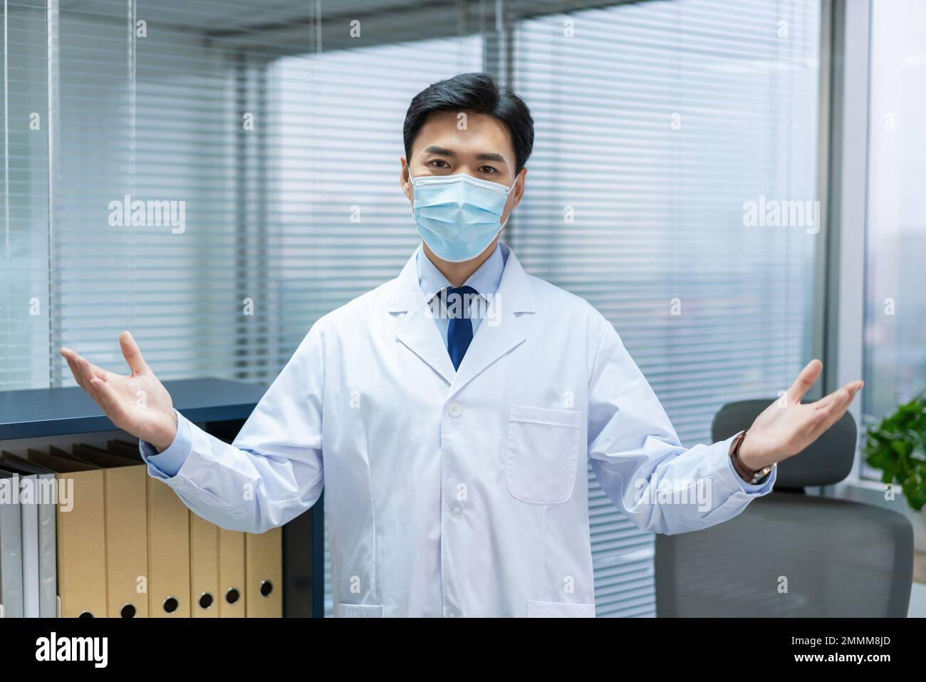 Young men wearing medical masks hi-res stock photography and images - Alamy