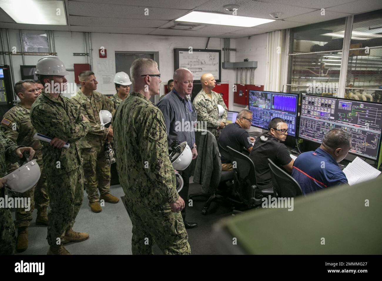 U.S. Navy Rear Adm. John Wade, the commander of Joint Task Force-Red Hill (JTF-RH), tours the Red Hill Bulk Fuel Storage Facility (RHBFSF) control room in Halawa, Hawaii, Sept. 20, 2022. Joint Task Force-Red Hill ensures the safe and expeditious defueling of the Red Hill Bulk Fuel Storage Facility through coordination with State and Federal stakeholders in order to set conditions for closure while continuing to rebuild trust with the State of Hawaii and the local community of Oahu. Stock Photo