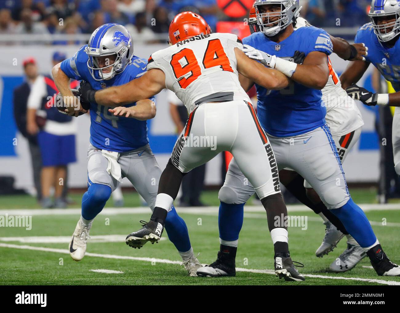 Cleveland Browns defensive end Carl Nassib (94) knocks the ball away ...