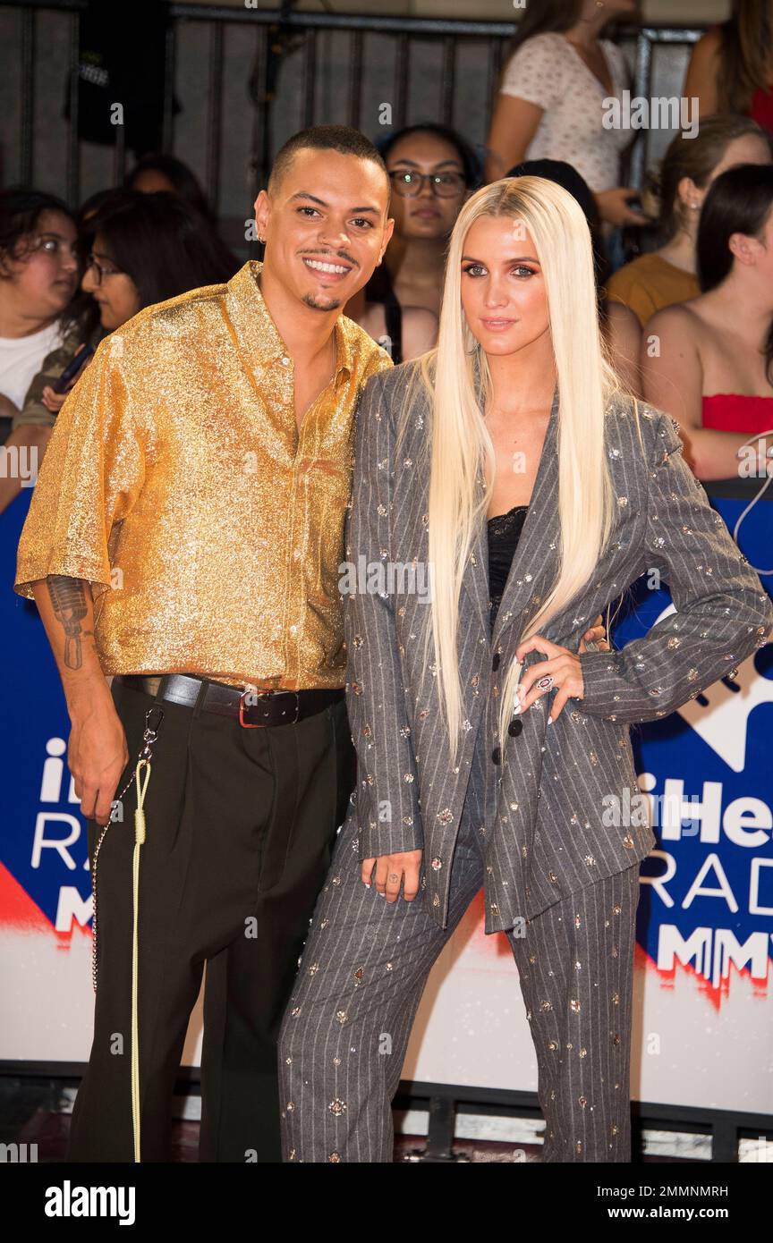 Ashlee Simpson, right, and Evan Ross arrive at the iHeartRadio