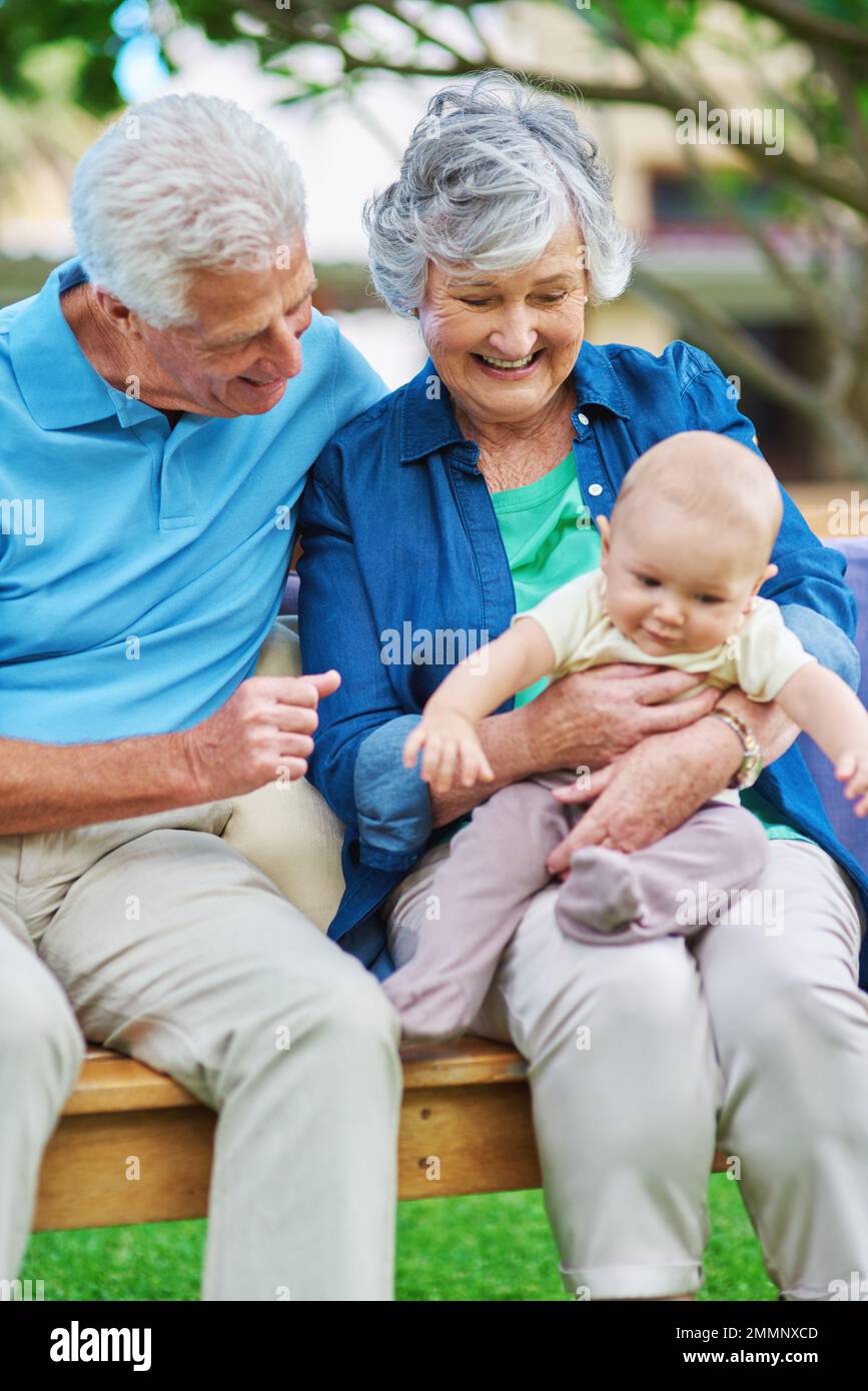 Grandkids make life grand. a senior couple spending time with their grandson. Stock Photo