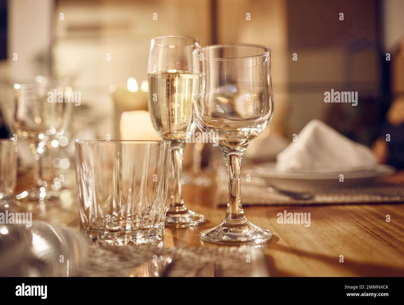 Drink, glass and dinner with party, celebration event with glassware, elegant and luxury in restaurant or banquet. Table setting, alcohol and Stock Photo