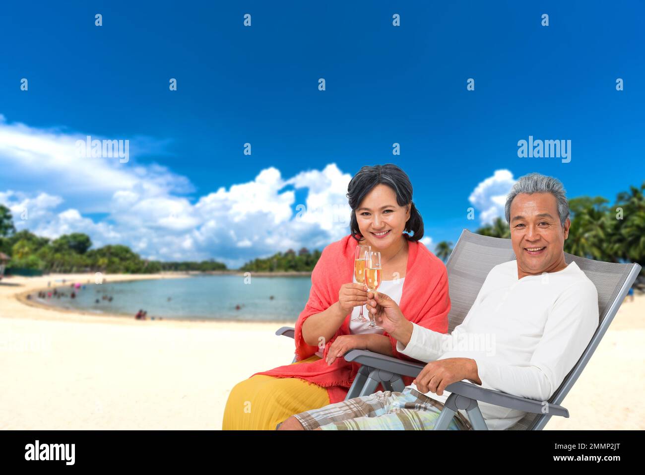 Elderly couple champagne beach hi-res stock photography and images - Alamy