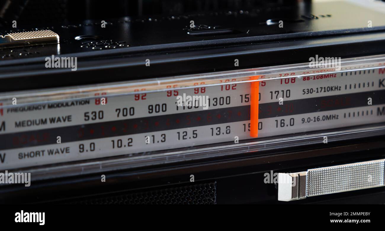 Tuning Analog Radio Dial Frequency on Scale of the Vintage Receiver. Stock Photo