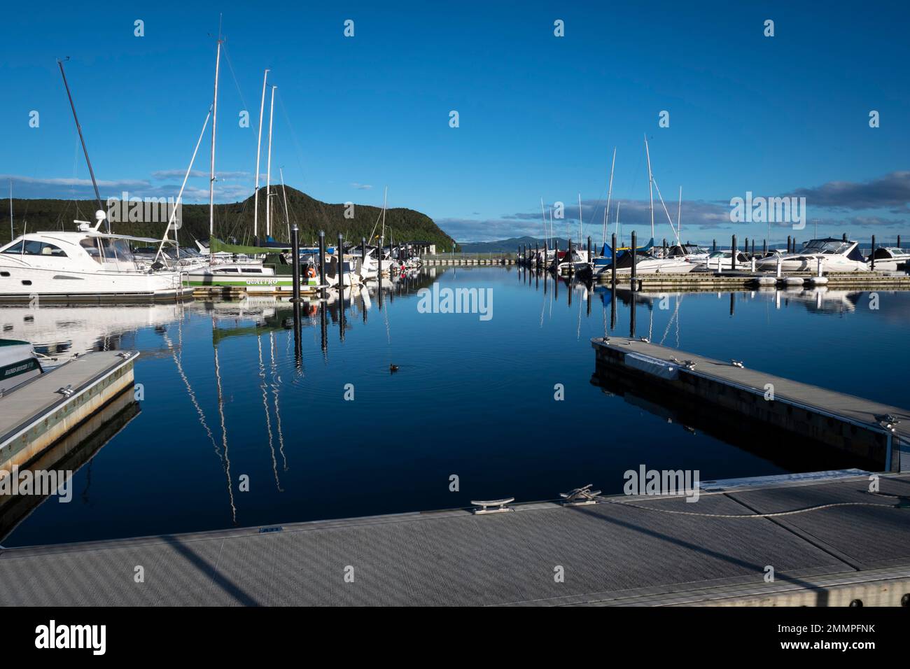 Boats moored at Motuoapu Marina, Lake Taupo, North Island, New Zealand Stock Photo