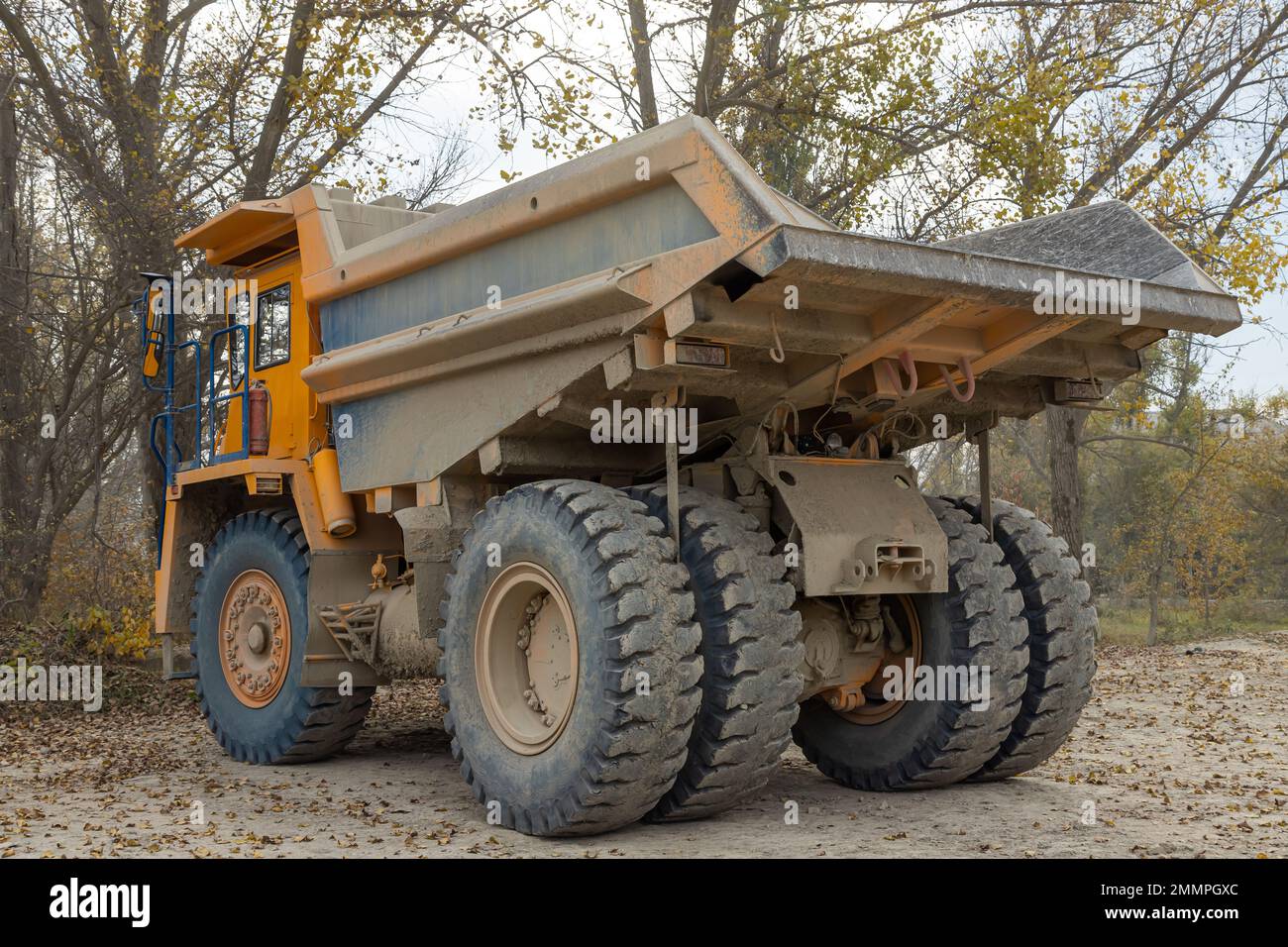 Large mining dump truck. Transport industry. Extraction of stone in an ...