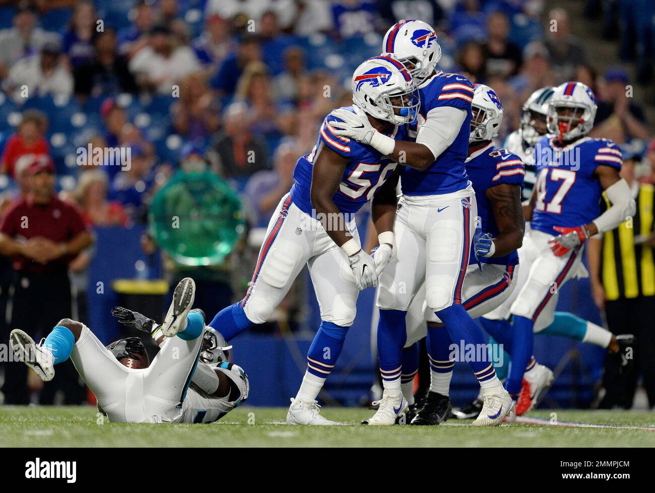 Buffalo Bills defensive end Mike Love walks off the field after a preseason NFL  football game against the Denver Broncos in Orchard Park, N.Y., Saturday,  Aug. 20, 2022. (AP Photo/Adrian Kraus Stock