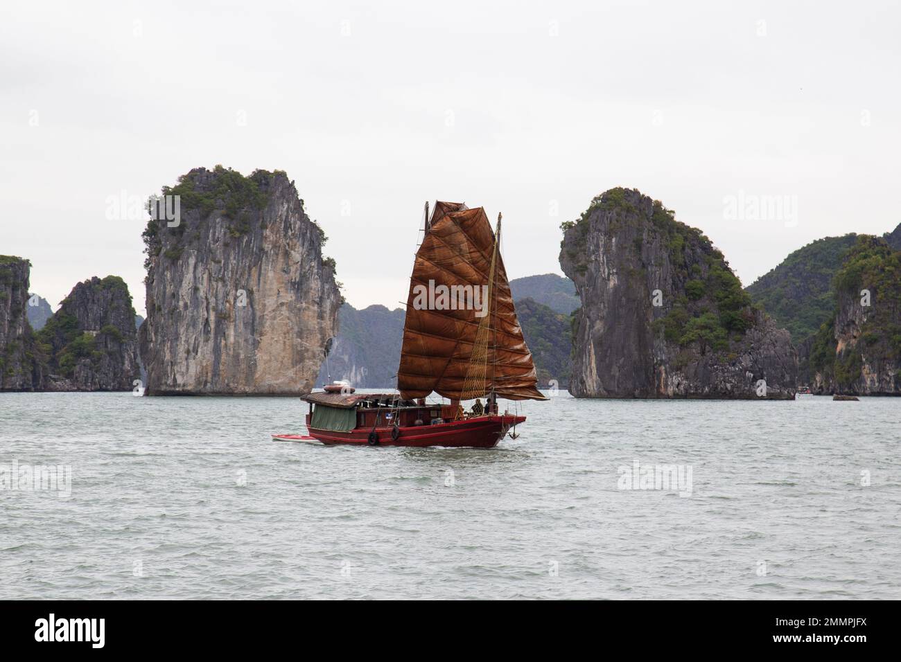 Ha Long Bay ( Halong bay ) View Over Landscape - boats float through the impressive landscape . Ha Long Bay , Vietnam Stock Photo