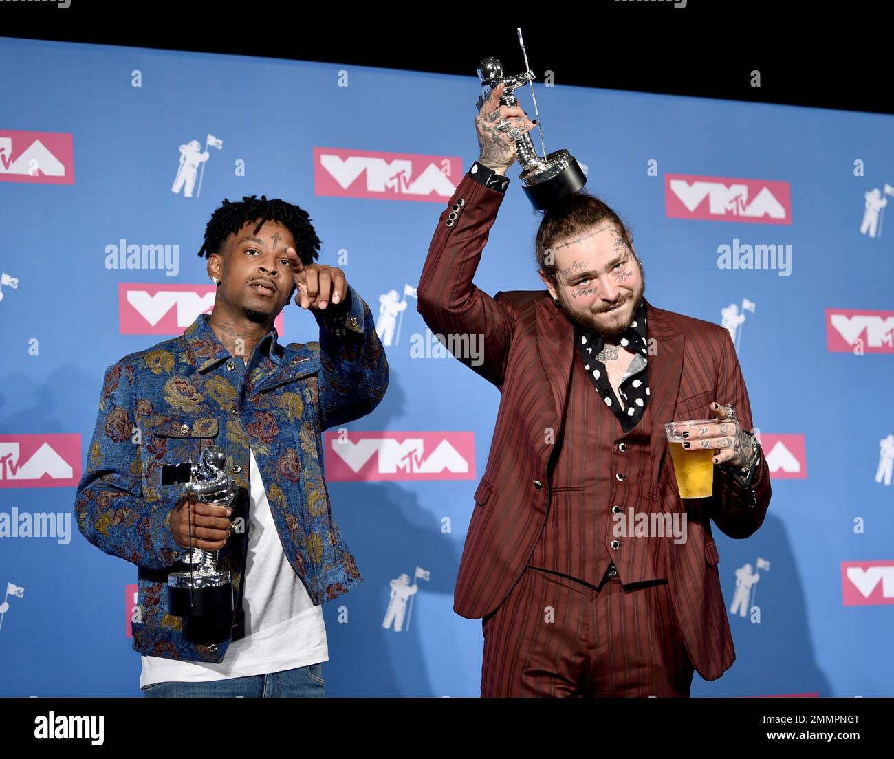 Recording artists 21 Savage (L) and Post Malone appear backstage after  winning the top Rap Song award for 'Rockstar,'' during the 2018 Billboard  Music Awards at MGM Grand Garden Arena on May