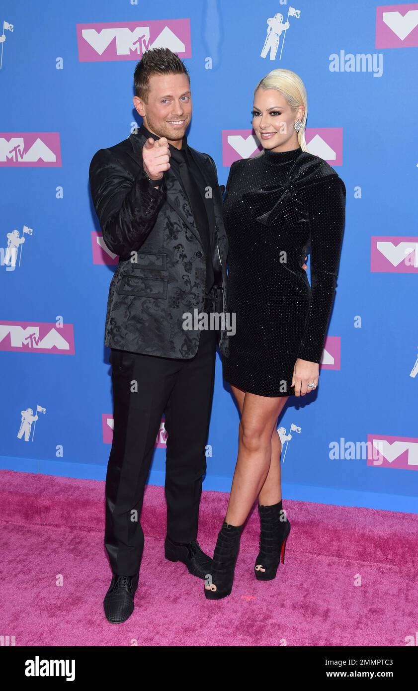 Michael "The Miz" Mizanin, left, and Maryse Quellet arrive at the MTV