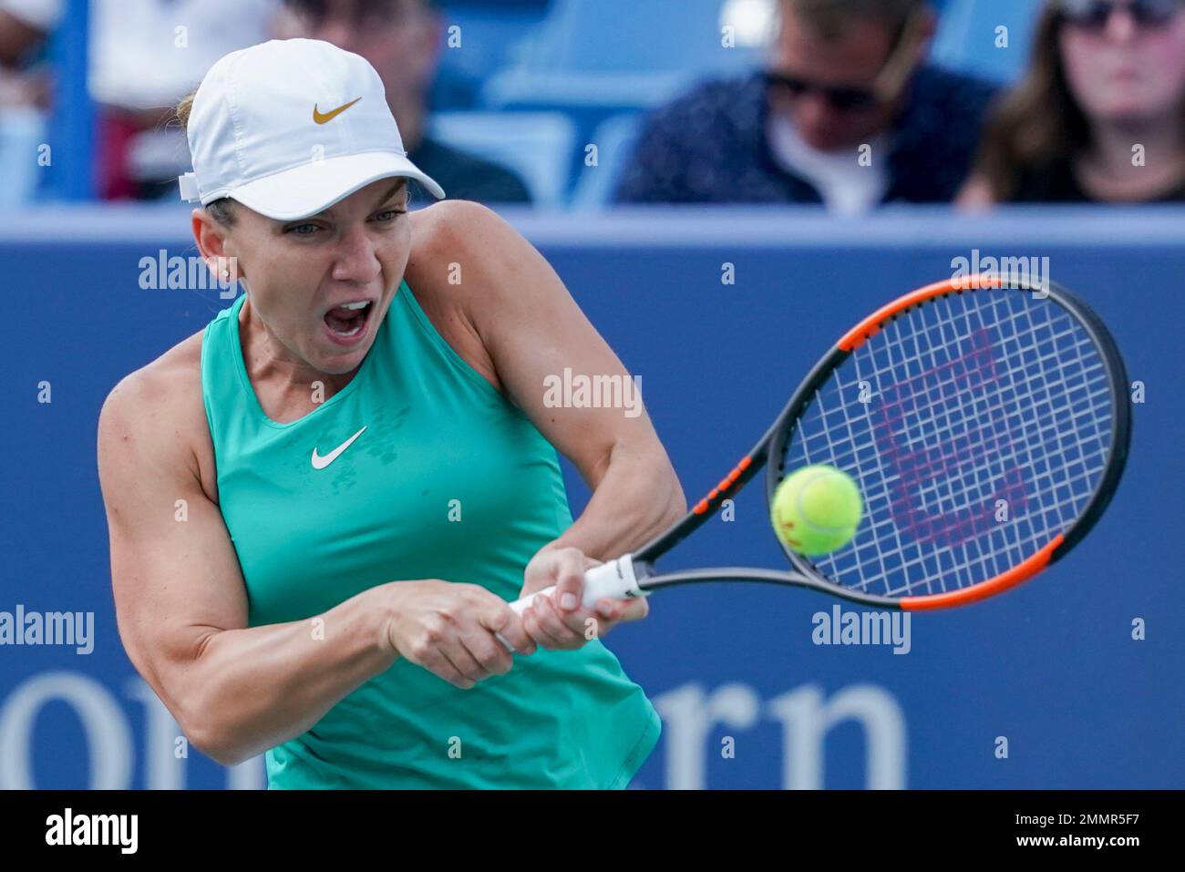 Simona Halep, of Romania, returns to Aryna Sabalenka, of Belarus, in a