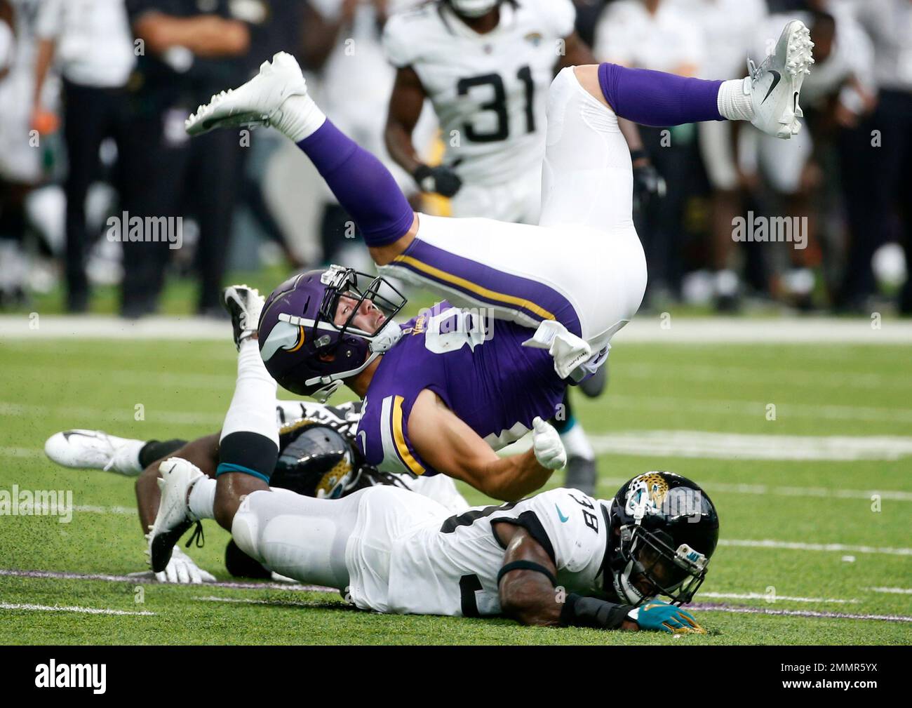 Minnesota Vikings wide receiver Chad Beebe (84) is tackled by Jacksonville  Jaguars defensive back C.J. Reavis (38) after making a reception during the  second half of an NFL preseason football game, Saturday,