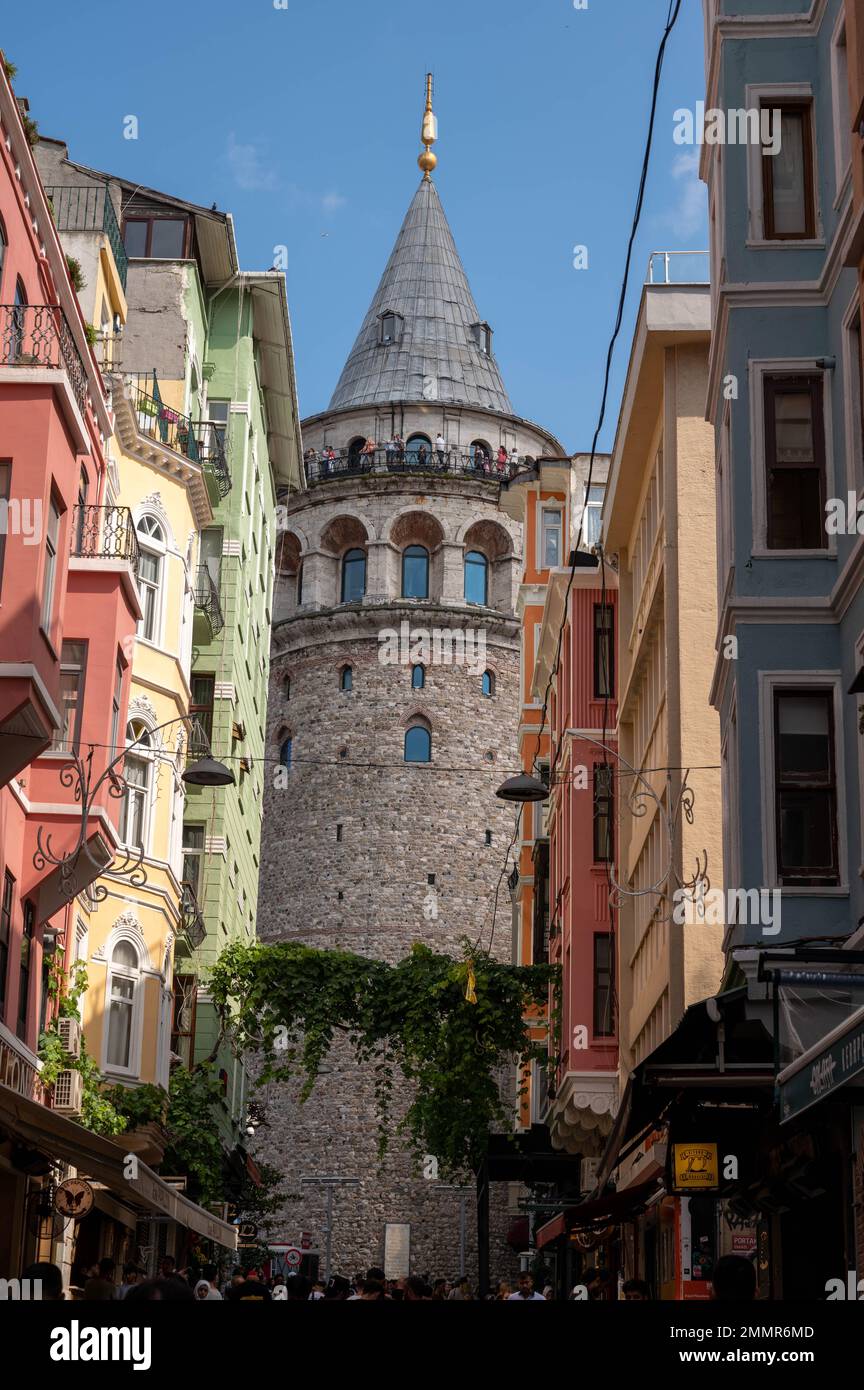 Galata Kulesi in Istanbul Turkey is a restored 14th-century tower and former prison overlooking the Bosphorus with a top-floor restaurant. Stock Photo