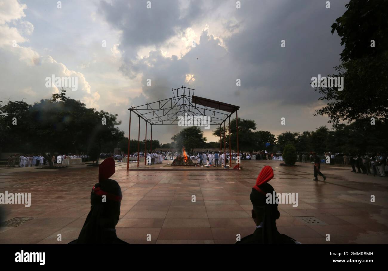 Flames rise from the funeral pyre of former Indian Prime Minister Atal