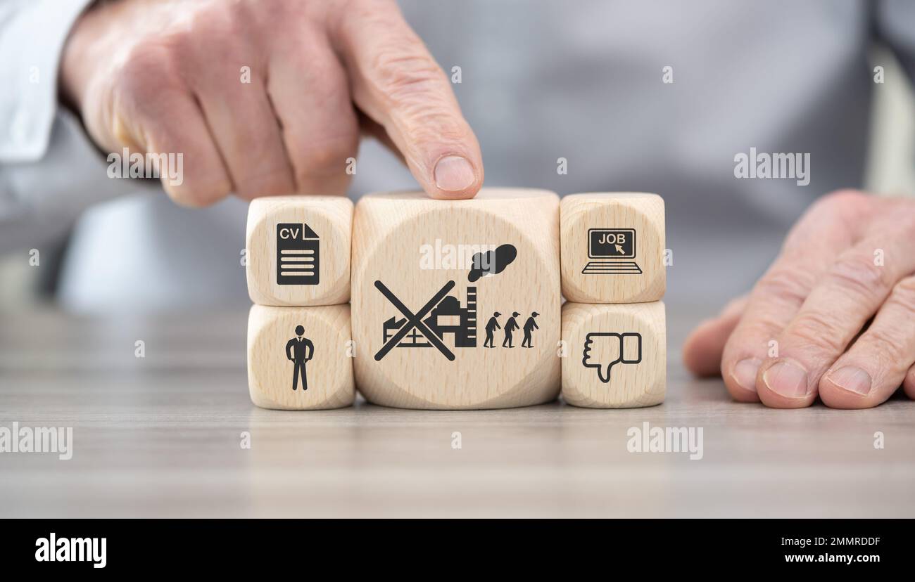 Wooden blocks with symbol of unemployment concept Stock Photo - Alamy