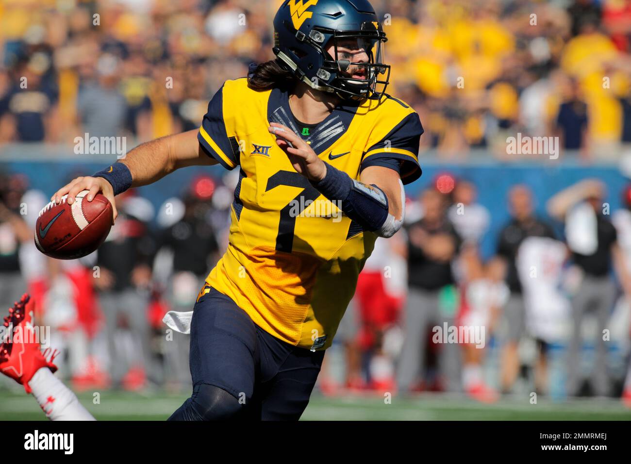 FILE In this Oct. 14, 2017, file photo, West Virginia quarterback