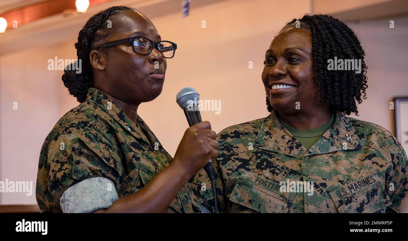 U.S. Navy Cmdr. Kimberly Cain, left, deputy chaplain with 1st Marine Aircraft Wing, thanks U.S. Marine Corps Col. Morina Foster, right, director of Defense Policy Review Initiative Division, Marine Corps Installations Pacific, for speaking during the Women’s Leadership and Education Forum on Camp Schwab, Okinawa, Japan, Sept. 22, 2022. WLEF provided an opportunity for networking, mentorship, education, and peer-to-peer collaboration among male and female service members. Stock Photo