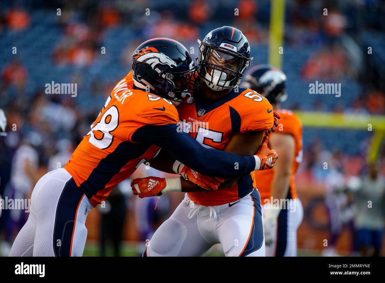 Denver Broncos linebacker Von Miller (58) and Bradley Chubb (55) runs a ...