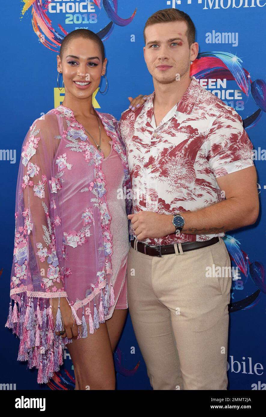 Hannah Harlow, left, and Oliver Stark arrive at the Teen Choice Awards