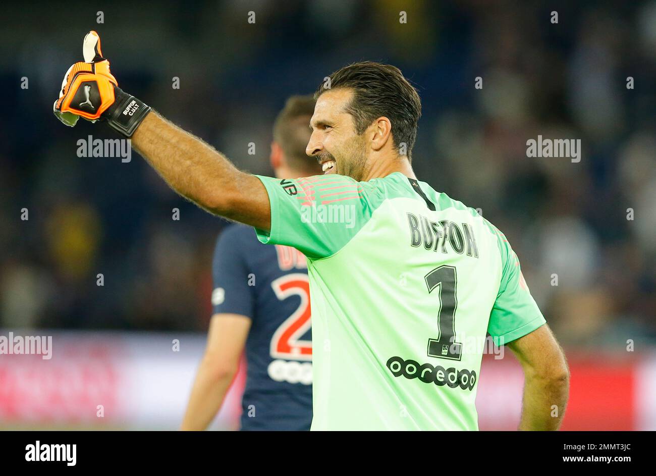 PSG's goalkeeper Gianluigi Buffon gives the thumb-up sign during their ...