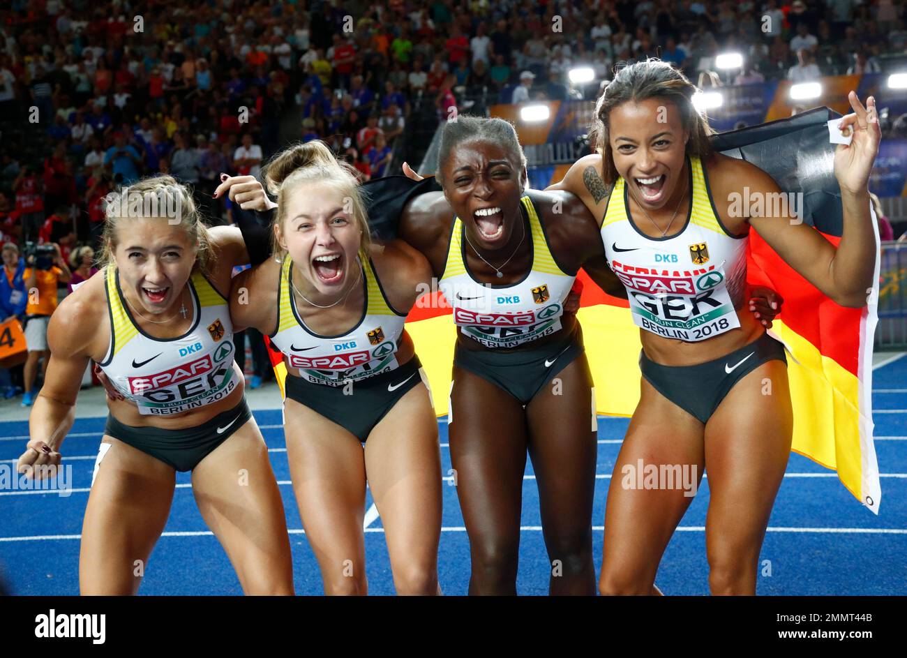 The German relay team celebrate their broke medal in the women's 4x100