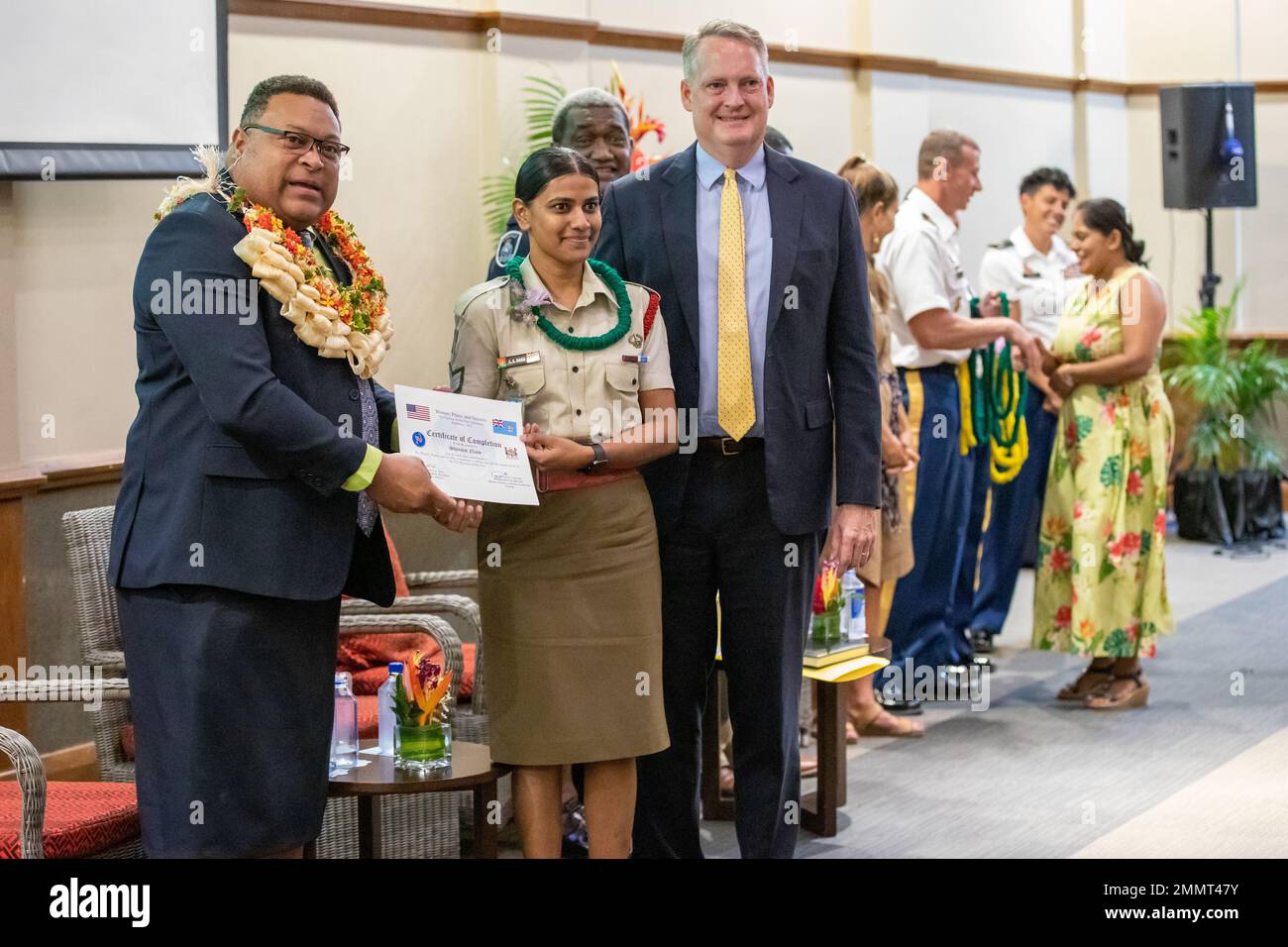 From left, Permanent Secretary Manasa Lesuma, with the Ministry of Defence, Sgt. Sheemal Nand, with the Republic of Fiji Military Forces, and Chargé d’Affaires Antone Greubel, with the U.S. Embassy – Suva, pose for a photo at the closing ceremony for Fiji’s first Women, Peace and Security National Action Plan Orientation Workshop at The Grand Pacific Hotel in Suva, Fiji, Sept. 23, 2022. Nand received a certificate for completing the workshop and contributing toward a Fiji WPS strategy. Stock Photo