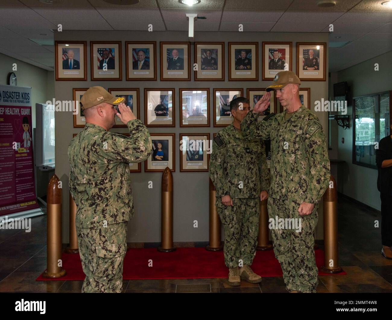 ASAN, Guam (Sept. 22, 2022) - Capt. Michael R. Baker, a Navy Chaplain, receives an ovation for his dedicated service from military and civilian personnel from Joint Region Marianas, Sept. 22. Chaplain Baker is continuing his service at U.S. Fleet Cyber Command, Ft. Meade, MD. Stock Photo