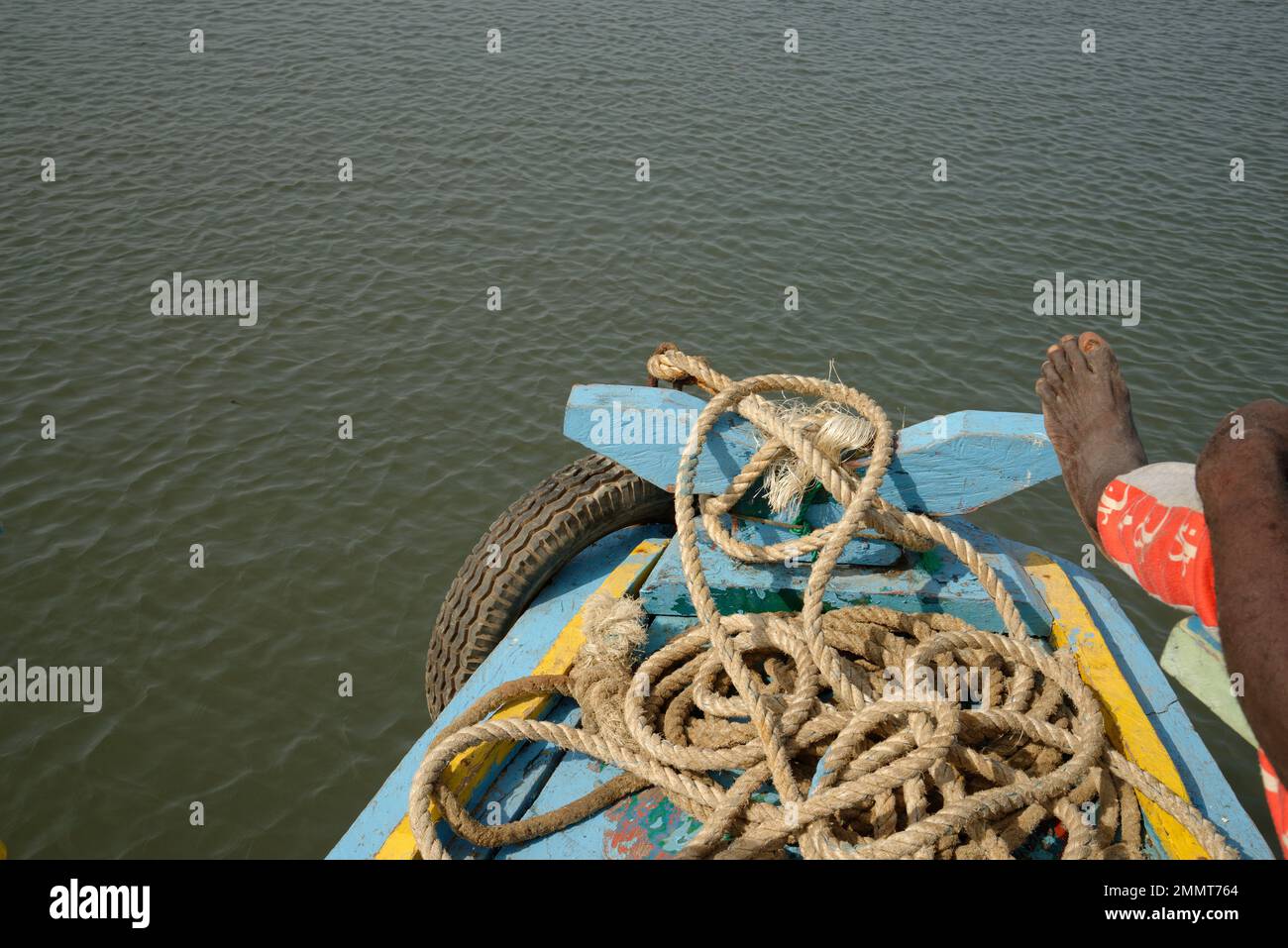 The front of a traditional painted boat on the Gambian river. Stock Photo