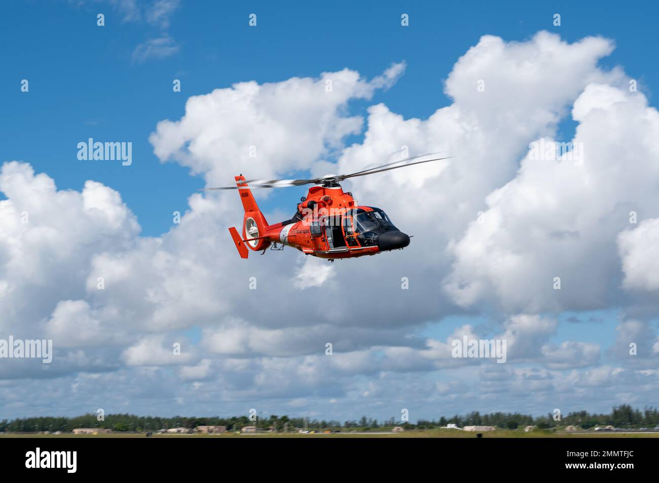 United States Coast Guard MH-65 Dolphin helicopter from Coast Guard Air Station Miami, training at Homestead ARB. Stock Photo