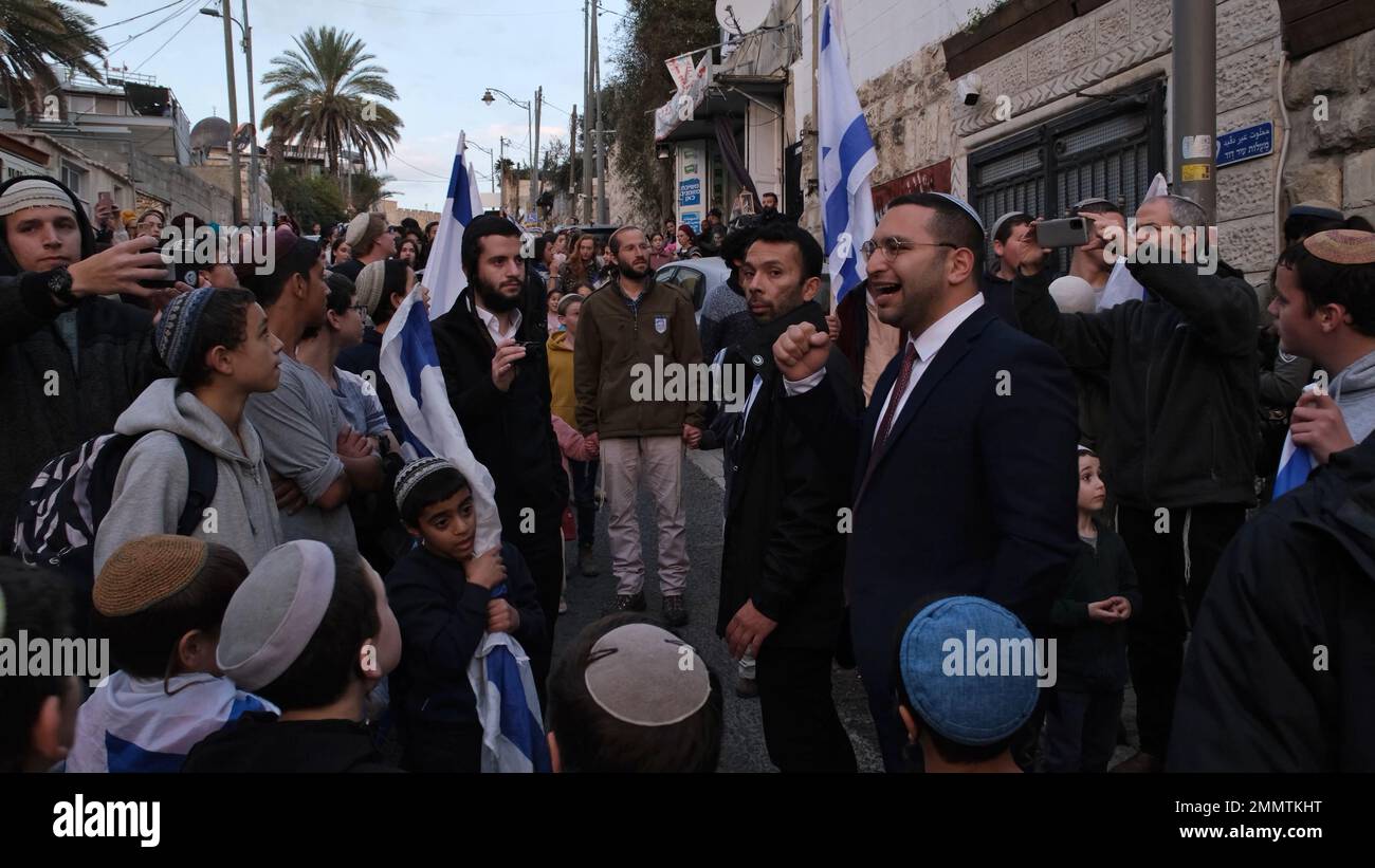 JERUSALEM, ISRAEL - JANUARY 29: Minister Yitzhak Wasserlauf of Otzma Yehudit far-right party speaks to Israeli nationalists taking part in a march at the site of Saturday's  shooting attack by a 13-year-old Palestinian in the Palestinian neighborhood of Silwan located just south of the Old City on January 29, 2023 in Jerusalem, Israel. Credit: Eddie Gerald/Alamy Live News Stock Photo