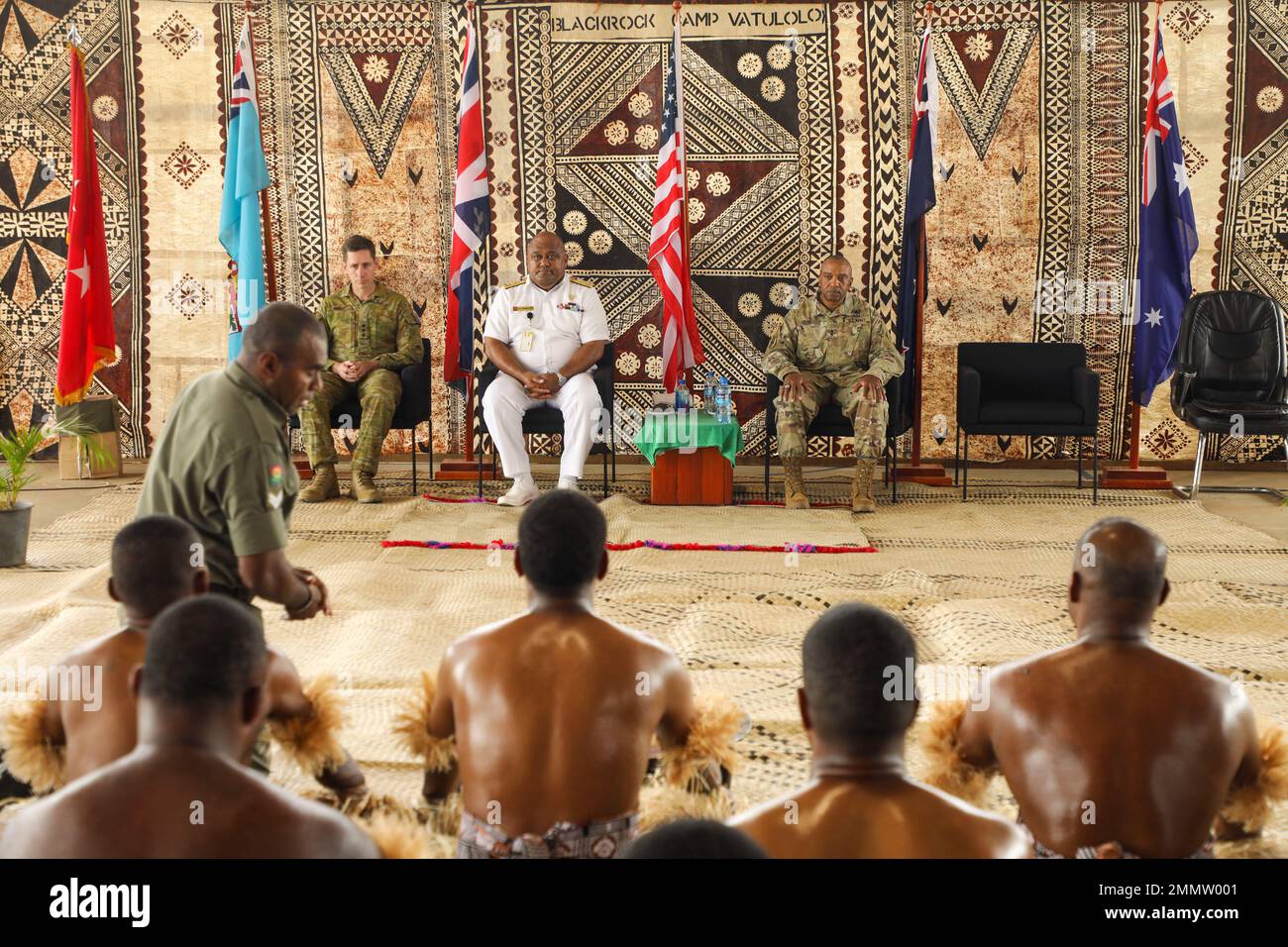 Col. Cain Wright, Australian Defence Force defence advisor, Commodore Humphrey Tawake, Republic of Fiji Military Forces deputy commander, Maj. Gen. Reginald G.A. Neal, U.S. Army Pacific deputy commander – mobilization and reserve affairs, left to right, preside over the traditional kava portion of the closing ceremony festivities for Exercise Cartwheel at Blackrock Training Camp, Fiji, September 23, 2022. Exercise Cartwheel is a multilateral military-to-military training exercise with the U.S., Republic of Fiji Military, Australian, New Zealand, and British forces that builds expeditionary rea Stock Photo