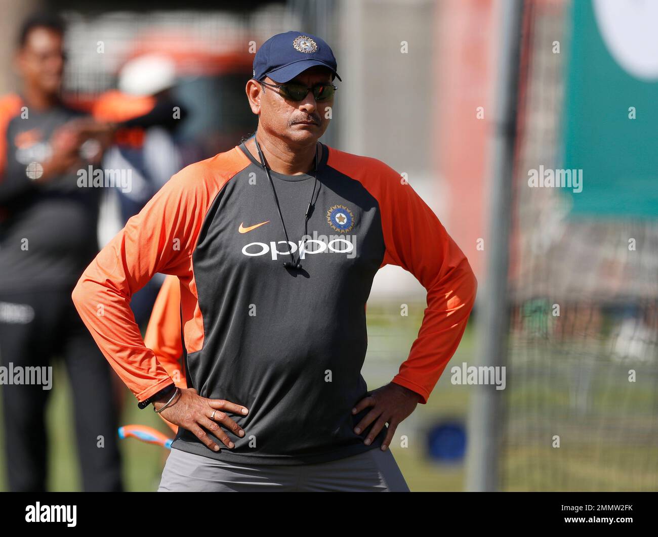 India's head coach Ravi Shastri watches his players in the nets during a training session at Lord's Cricket in London, Tuesday, Aug. 7, England will play India in the second