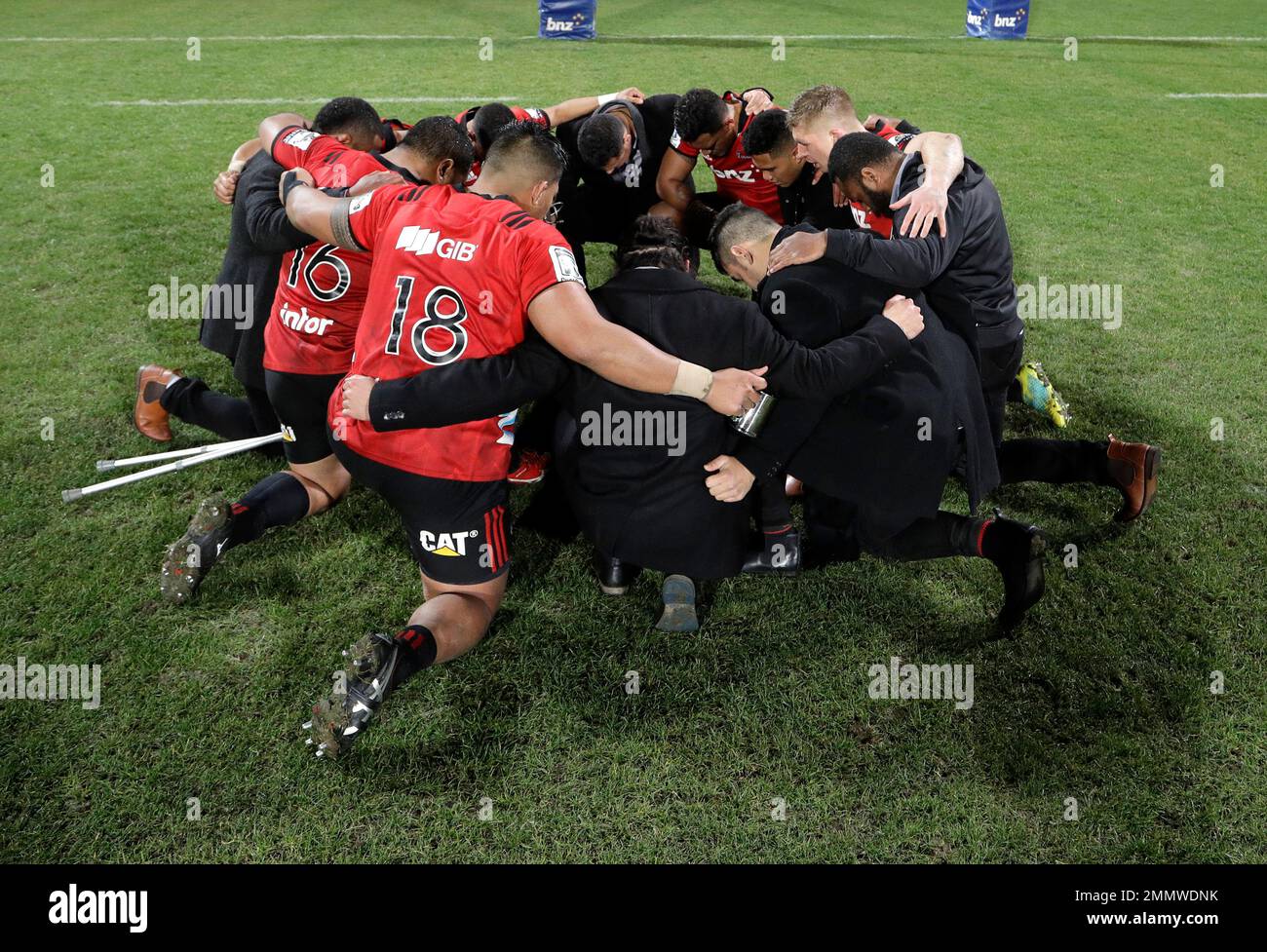 Crusaders players embrace in prayer after defeating the Lions 38-17 to win  Super Rugby final in Christchurch, New Zealand, Saturday, Aug. 4, 2018. (AP  Photo/Mark Baker Stock Photo - Alamy