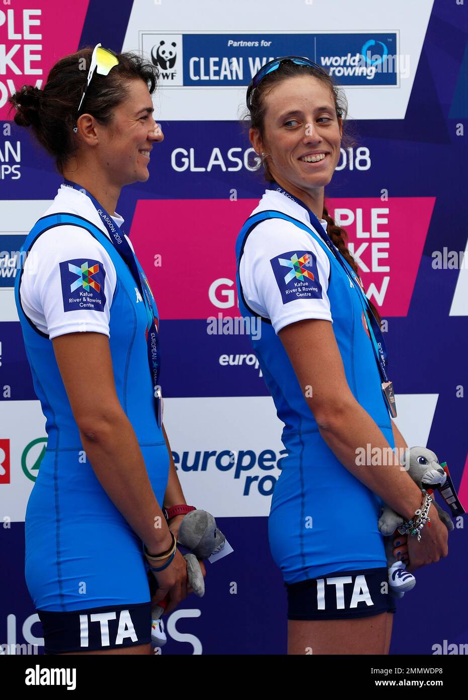 Alessandra Patelli and Sara Bertolasi of Italy stand with their bronze