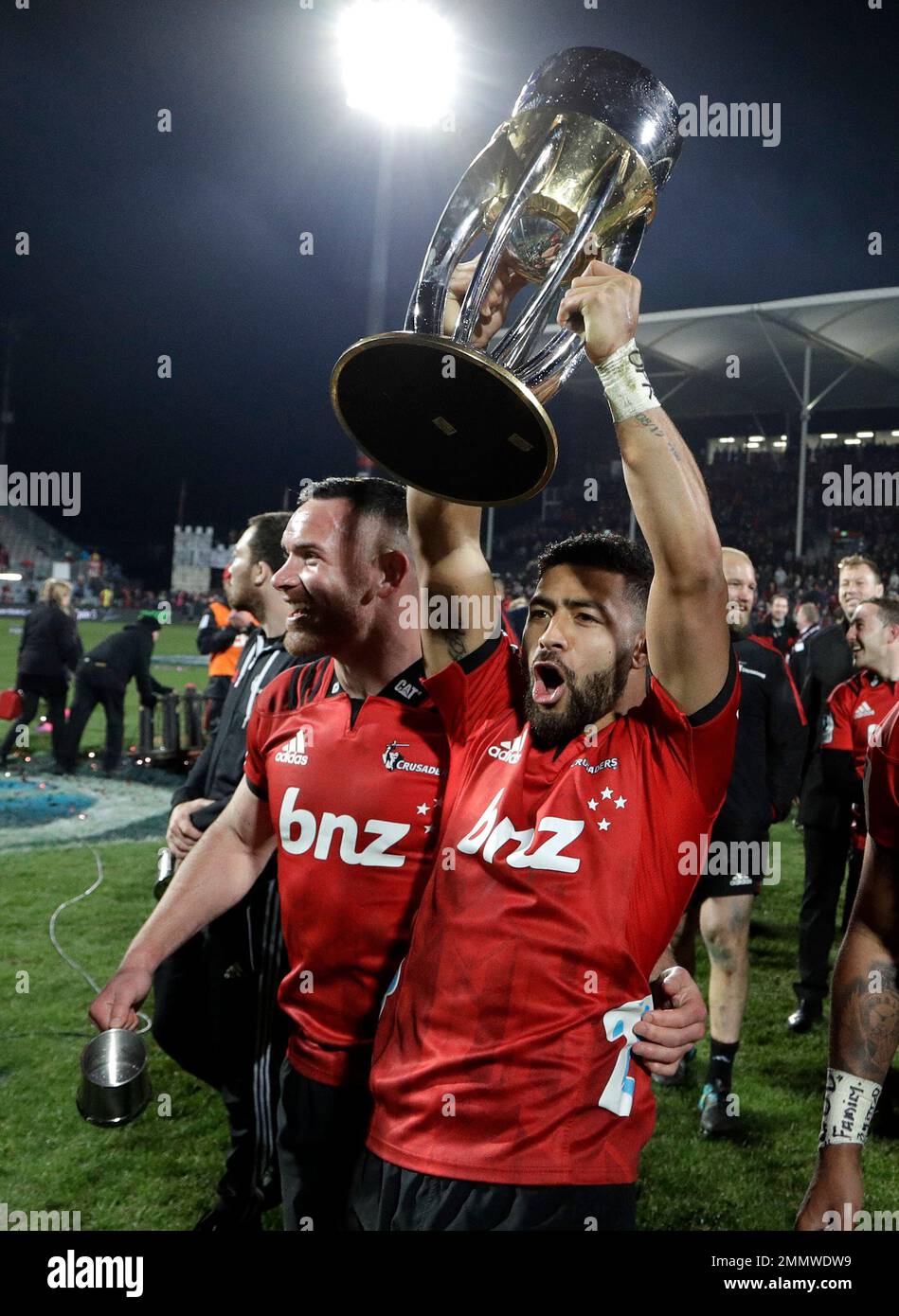 Crusaders Richie Mo'unga celebrates with the trophy after defeating the  Lions 38-17 to win Super Rugby final in Christchurch, New Zealand,  Saturday, Aug. 4, 2018. (AP Photo/Mark Baker Stock Photo - Alamy