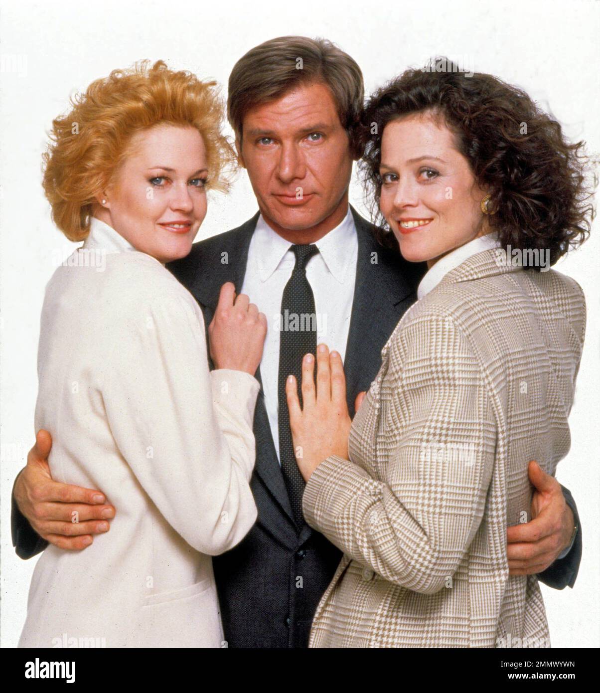 SIGOURNEY WEAVER, HARRISON FORD and MELANIE GRIFFITH in WORKING GIRL (1988), directed by MIKE NICHOLS. Credit: 20TH CENTURY FOX / Album Stock Photo