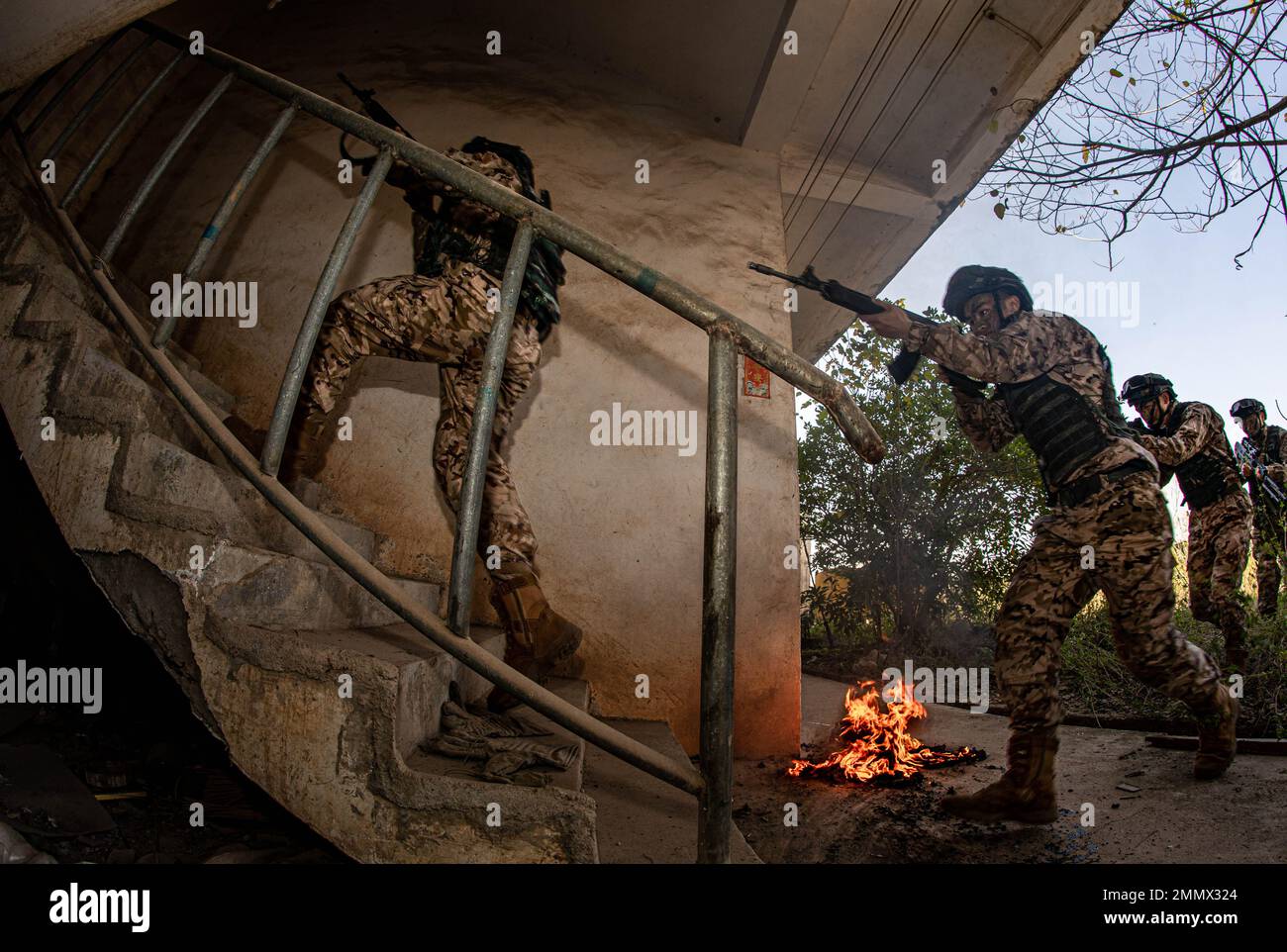 GUIGANG, CHINA - JANUARY 30, 2023 - Chinese armed police conduct anti-hijacking training in Guigang, Guangxi Province, China, January 30, 2023. Stock Photo