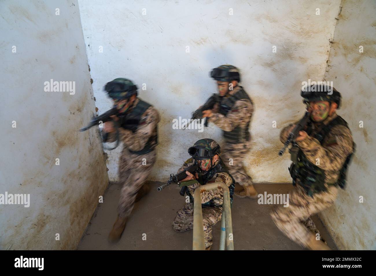 GUIGANG, CHINA - JANUARY 30, 2023 - Chinese armed police conduct anti-hijacking training in Guigang, Guangxi Province, China, January 30, 2023. Stock Photo