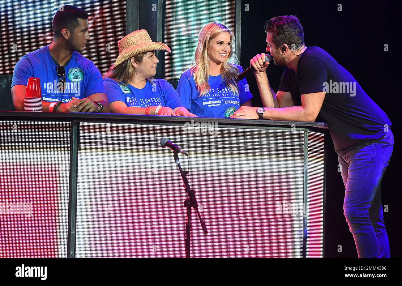 IMAGE DISTRIBUTED FOR CHASE Fans onstage with Brett Eldredge on