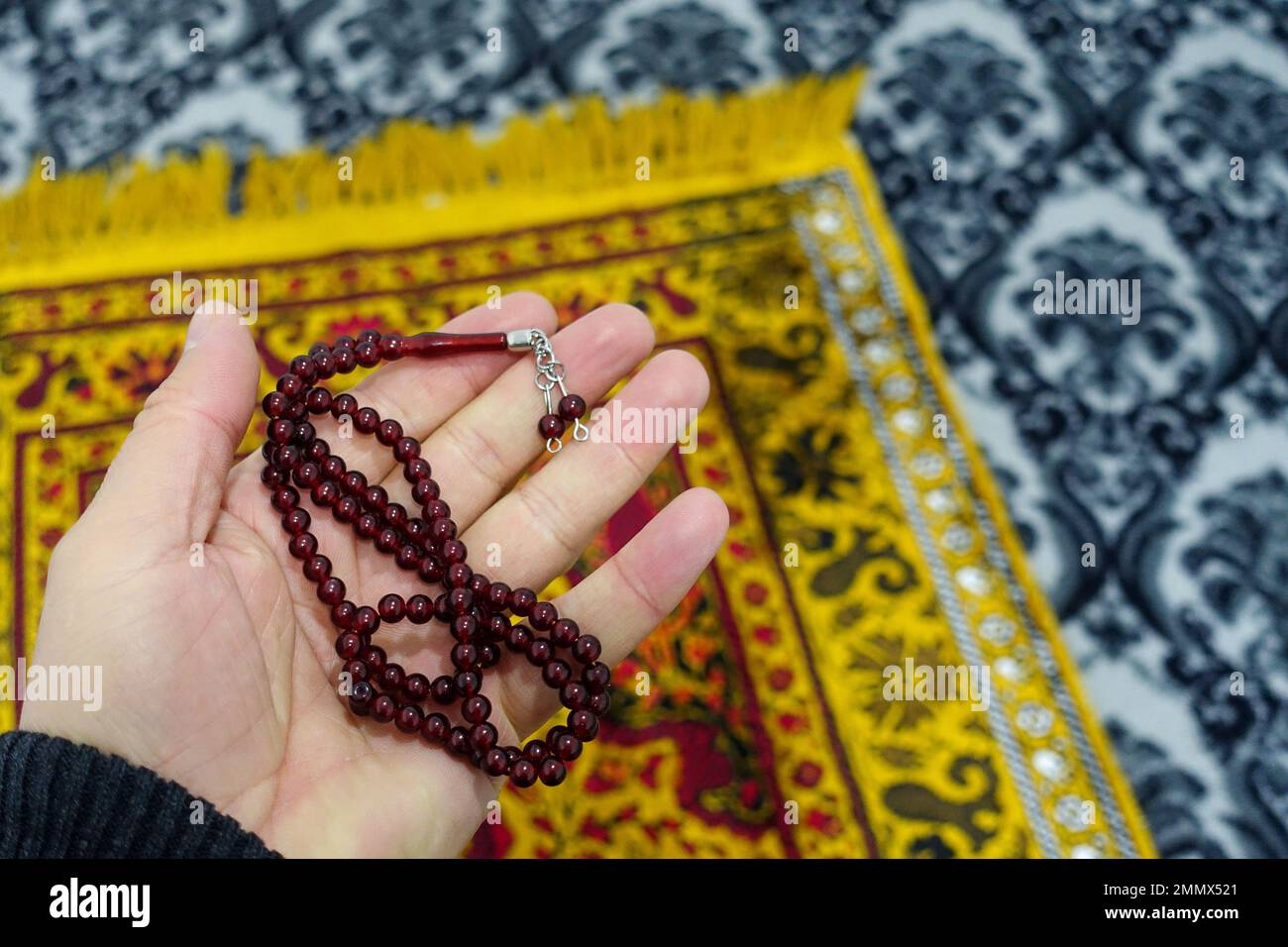 prayer rug, mosque and prayer rug, closeup rosary and prayer rug